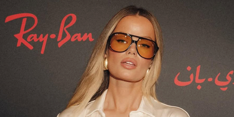 Model Frida Aasen was seen wearing black Ray-Ban Bill RB 2198 901/R6 aviator sunglasses with yellow lenses at Doha Art Basel, February 2026.