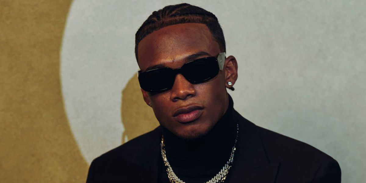 Garrett Wilson was seen wearing black Prada PR 17WS 1AB5S0 Symbole Sunglasses after winning Offensive Rookie of the Year during NFL Honor in Phoenix, Aruzona, February 2023