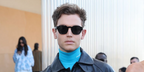 George Tabor-King was seen wearing black Prada PR A16S 16K731 sunglasses at the Prada Fall/Winter 2026 fashion show during Milan Fashion Week.