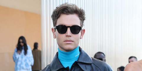 George Tabor-King was seen wearing black Prada PR A16S 16K731 sunglasses at the Prada Fall/Winter 2026 fashion show during Milan Fashion Week.
