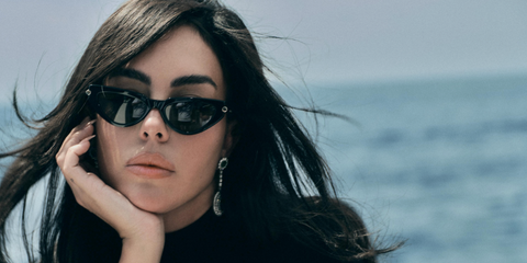 Georgina Rodriguez was seen wearing black Alexander McQueen AM0520S 001 sunglasses in a Harper's Bazaar Espana feature, June 2026.