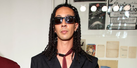 Italian rapper Ghali was seen wearing black Gucci GG1524S 001 sunglasses at the Gucci Menswear Spring/Summer 2025 fashion show during Milan Men's Fashion Week.