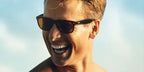 Glen Powell was seen wearing tortoise Ray-Ban New Wayfarer 2132 710 sunglasses with brown lenses in Top Gun: Maverick as Hangman