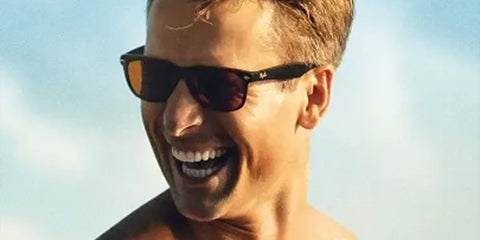 Glen Powell was seen wearing tortoise Ray-Ban New Wayfarer 2132 710 sunglasses with brown lenses in Top Gun: Maverick as Hangman