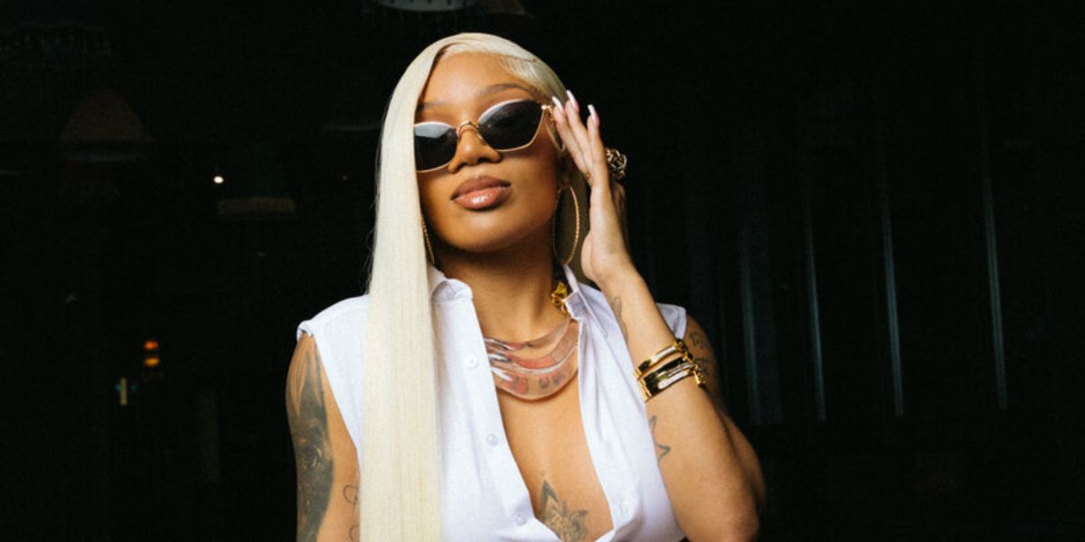 GloRilla was seen wearing gold Loewe Metal LW40115U 30A sunglasses in a feature by The New York Times