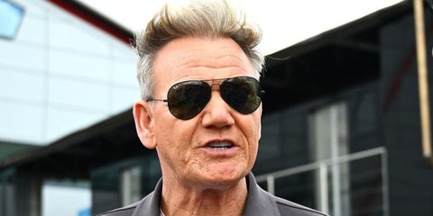 Gordon Ramsay is seen wearing Ray-Ban Aviator 3025 002/58 Polarised in black frame to the 2024 Abu Dhabi Grand Prix