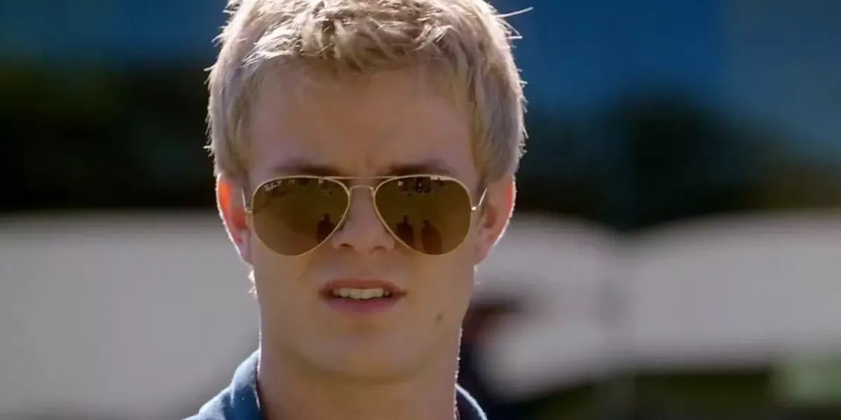 Actor Graham Rogers was seen wearing gold Ray-Ban Aviator 3025 001/57 sunglasses with brown Polarised lenses in Quantico, season 1 episode 6 as Caleb Haas.