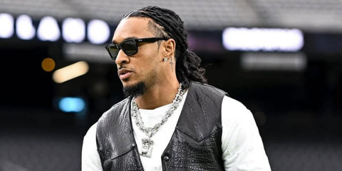 American football player Grant Delpit of Cleveland Browns was seen wearing black Ray-Ban Wayfarer Reverse RB R0502S 6677/VR sunglasses in his Instagram post, December 2025.
