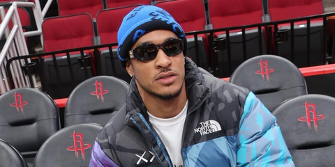 American football player Grant Delpit of Cleveland Browns was seen wearing black Versace 4361 GB1/87 Medusa Biggie Sunglasses in his Instagram post, March 2022.