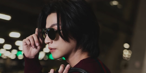 Thai actor and celebrity Gulf Kanawut was seen wearing silver Gucci GG1962S 001 aviator sunglasses with grey lenses in a Men's Folio feature, February 2026.