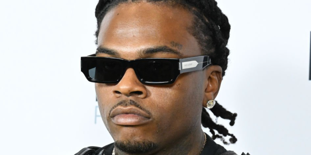 Whitecapper Rapper Sl Rapper Gunna at the iHeart Radio Awards 2024 wearing black Saint ...