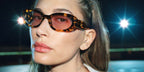 Hailey Bieber wore tortoise Miu Miu MU C01S 14L4I0 Ciel sunglasses in the Miu Miu Fall/Winter 2026 campaign.