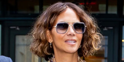 Halle Berry was seen wearing gold and grey Dita Flight .006 7806 H sunglasses with brown gradient lenses during the press tour of "Never Let Go"