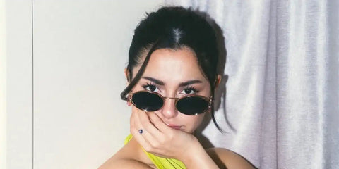 Pakistani actress Hania Aamir was seen wearing gold Miu Miu MU 52YS 7OE01T round oval sunglasses in her social media post. Shop online now on Pretavoir