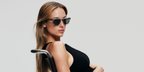 Hannah Ferguson was seen modeling transparent Oliver Peoples Oliver Sixties Sun OV5522SU 1752/R5 sunglasses in the Oliver Peoples Fall 2023 campaign