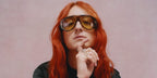 Fashion designer Harris Reed was seen wearing striped brown Tom Ford Bronson TF1044 56E sunglasses with yellow lenses in an Elle Magazine feature.