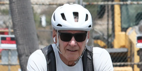 Harrison Ford was seen wearing black Oakley Holbrook OO9102 E8 sunglasses during a workout and cycling session in July 2026.