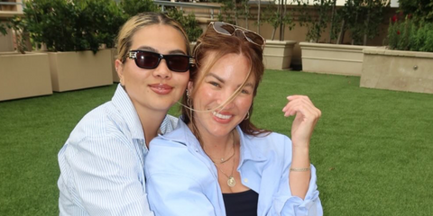 American singer Hayley Kiyoko, pictured on the left with TikToker girlfriend Becca Tilley, was seen wearing black Bottega Veneta BV1308S 001 rectangular sunglasses in her Instagram post