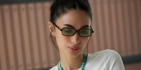 Heart Evangelista was seen wearing tortoise Miu Miu MU 11ZS VAU04M rectangular sunglasses with green mirror lenses in her Instagram post, April 2026.