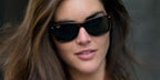 Model Hilary Rhoda was seen wearing the iconic Ray-Ban Wayfarer 2140 901 Black sunglasses