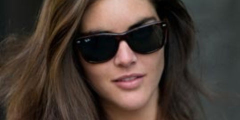 Model Hilary Rhoda was seen wearing the iconic Ray-Ban Wayfarer 2140 901 Black sunglasses
