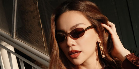 Vietnamese singer Ho Ngoc Ha was seen wearing gold Bottega Veneta Sardine BV1386S 001 oval sunglasses in her social media post, November 2025.