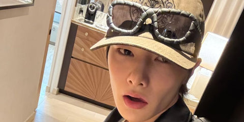 South Korean singer I.N. of K Pop group Stray Kids was seen wearing black Bottega Veneta BV1303S 001 intrecciato sunglasses in his Instagram post, September 2025. Shop online now on Pretavoir