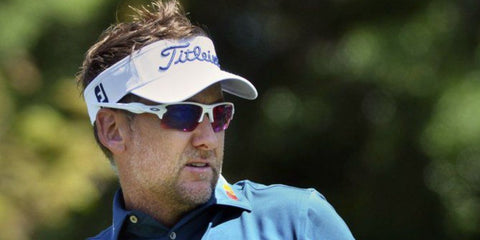 Professional golfer Ian Poulter was seen wearing white Oakley Flak 2.0 XL OO9188 03 Prizm sunglasses