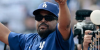 Ice Cube was seen wearing black Prada PR 06YS 16K2K1 rectangular sunglasses with dark grey lenses at the 2025 Major League Baseball season home opening game