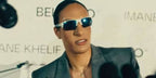 Algerian boxer Imane Khelif was seen wearing white Oakley Flak 2.0 XL OO9188 94 sunglasses with Prizm Sapphire lenses at an event as the face of the Algerian beauty brand Bel*nco