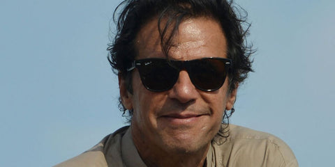 Pakistani cricketer turned politician Imran Khan was seen wearing tortoiseshell Ray-Ban Folding Wayfarer 4105 710 sunglasses with brown Polarised lenses during an anti-government protest in Islamabad, September 2014