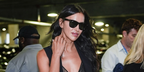 Russian supermodel Irina Shayk was seen wearing black Ray-Ban Folding Wayfarer 4105 601 sunglasses on the Day 14 of US Open 2025. Shop online now on Pretavoir