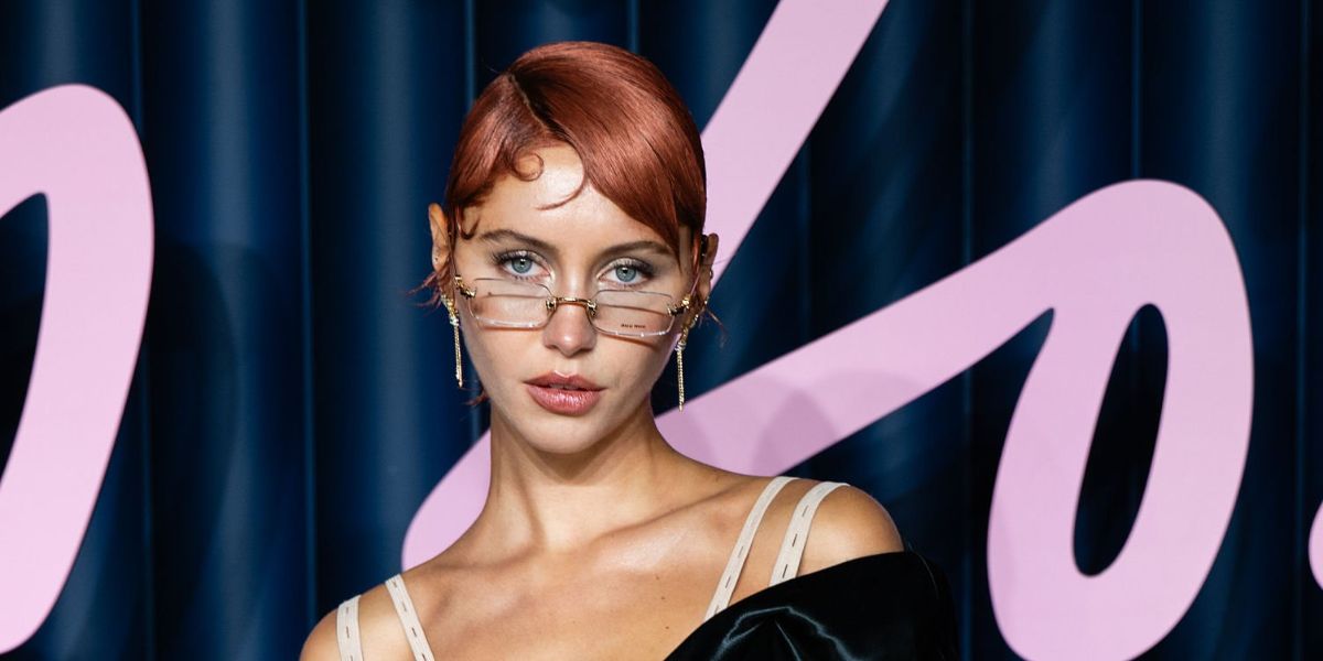 Iris Law was seen wearing pale gold Miu Miu MU 50YV ZVN1O1 optical glasses at The Fashion Awards 2025 in London.