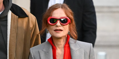 Isabelle Huppert is seen wearing Loewe Inflated LW40099I 66A sunglasses in red to an event at Le Printemps, Paris