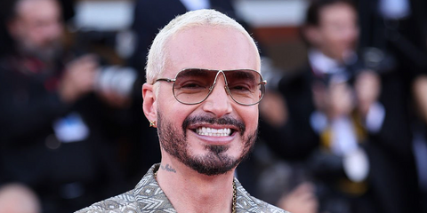 J Balvin was seen wearing gold Miu Miu MU A56S 5AK90L sunglasses with brown gradient lenses on the Opening Day of 83rd Venice Film Festival, September 2026