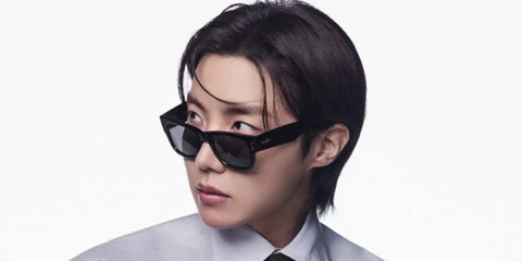 South Korean singer J Hope of BTS was seen wearing black Ray-Ban Mega Wayfarer RB 0840S 901/31 sunglasses in the Sure Magazine feature, ahead of the BTS Comeback Tour in March 2026.