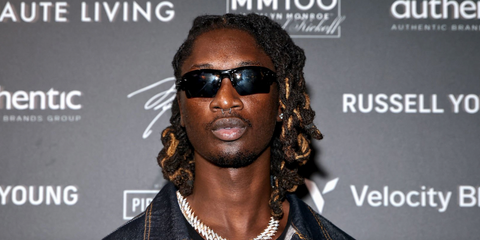 JNR CHOI was seen wearing polished black Oakley Flak 2.0 XL OO9188 72 Prizm Polarised sunglasses at the 