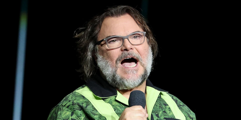 Actor and comedian Jack Black was seen wearing matte grey Ray-Ban RB 7047 5482 optical glasses during "Jumanji: Open World" promotion at the ComicCon 2026 in Las Vegas.