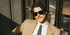 Canadian actor Jack Innanen was seen wearing black Saint Laurent SL 572 001 sunglasses in a Boys by Girls feature, May 2025.