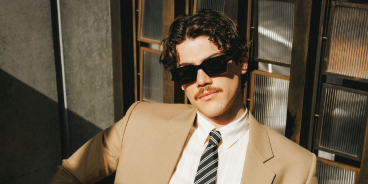 Canadian actor Jack Innanen was seen wearing black Saint Laurent SL 572 001 sunglasses in a Boys by Girls feature, May 2025.