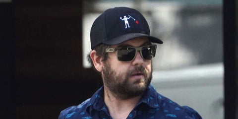 Jack Osbourne was seen wearing grey Oakley Holbrook XL OO9417 30 Prizm Polarised sunglasses in Los Angeles, August 2022.