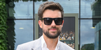 Comedian Jack Whitehall was seen wearing black David Beckham DB 7000/S 2M2IR square sunglasses at the Wimbledon Tennis Championships 2026.