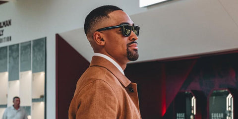 Philadelphia Eagles quarterback Jalen Hurts was seen wearing Tom Ford Buckley-02 TF906-N 01A square sunglasses to attend his Master's degree graduation in the University of Oklahoma