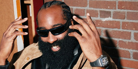 James Harden was seen wearing black Prada PR 25YS 1AB5S0 rectangular sunglasses in the cover story of SW Sportsworld Media, December 2024
