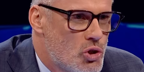 Jamie Carragher wears Tom Ford TF5818-B 052 Blue Control optical glasses during a TV appearance