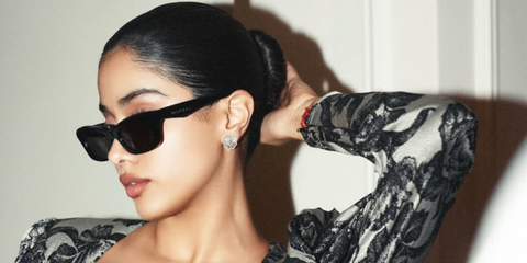 Bollywood actress Janhvi Kapoor was seen wearing black Alexander McQueen AM0474S 001 sunglasses during Paris Fashion Week Spring/Summer 2026.