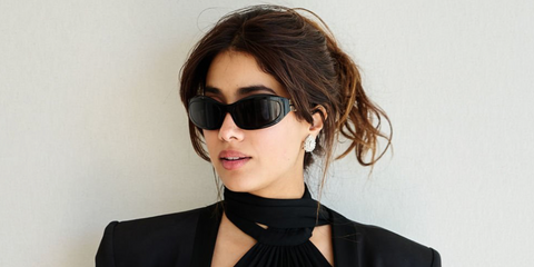 Bollywood actress Janhvi Kapoor was seen wearing black Miu Miu MU 14ZS 16K08Z sunglasses at the Cannes Film Festival 2025. Shop online now on Pretavoir
