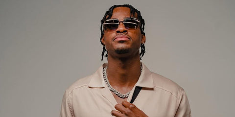 Basketball player Jarred Vanderbilt of the Los Angeles Lakers was seen wearing Saint Laurent Sun SL 312 M 008 sunglasses in his Instagram post, September 2022.