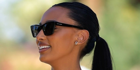 American model Jasmine Tookes at Coachella in 2023 wearing Saint Laurent Mica Sunglasses in black