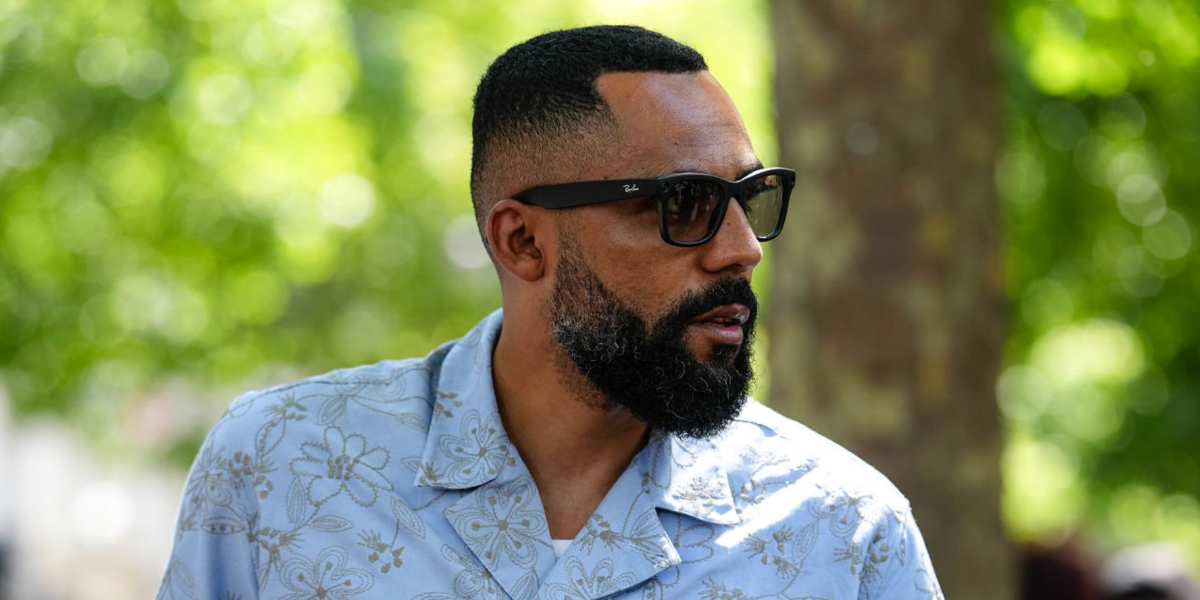 German-Cameroonian creative director and style icon Jean-Claude Mpassy was seen wearing Ray-Ban Meta Wayfarer RW4008 601S/1M Photochromic Smart Glasses during Paris Men's Fashion Week season Spring/Summer 2026